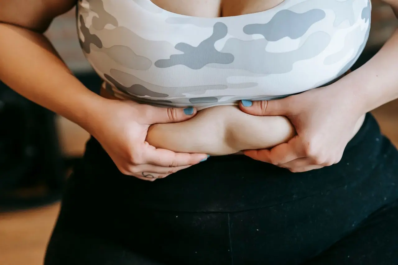 What Causes Low Belly Pooch in Women? 7 Real Reasons, and How to Tell Which Is Yours